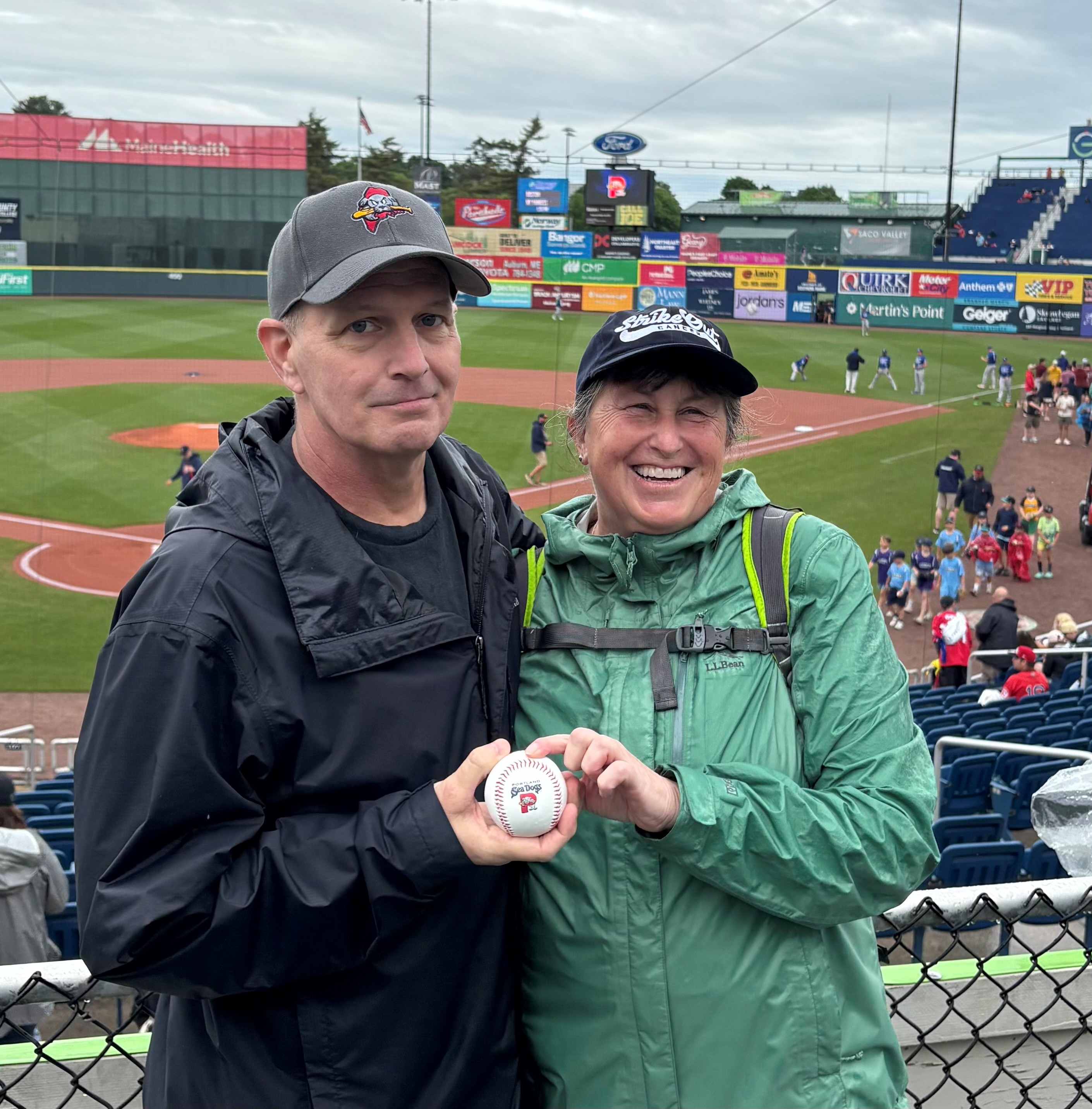 Dan Baldwin & Susan K-W holding ball - Cancer Survivors Day- Seadogs.jpg
