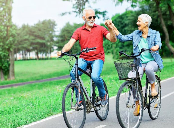 Older couple riding bicycles